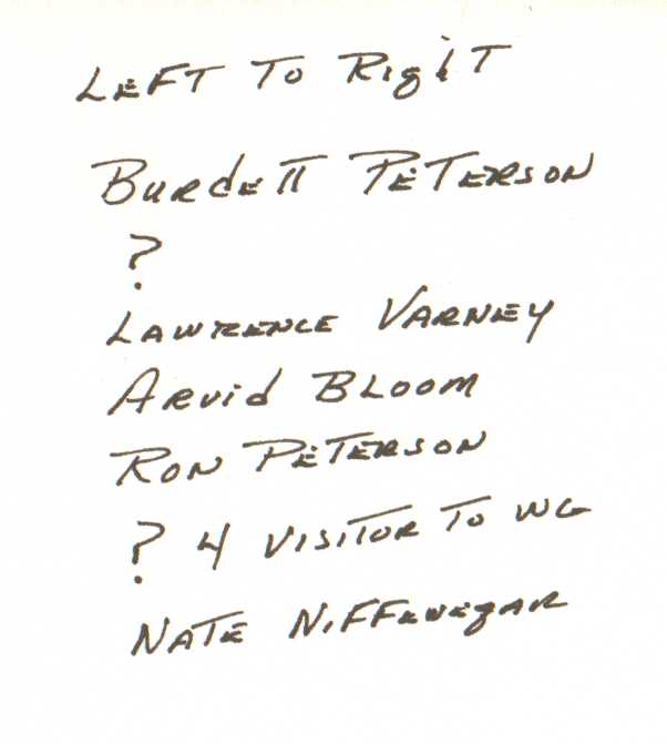 Woodward member names standing outside the visitor's lobby.